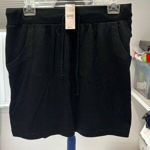 Never worn loft black skirt with draw string. . Size s. Pockets.